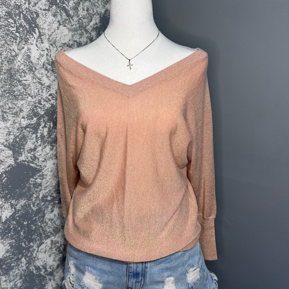 Off the shoulders shimmery bat wing style top